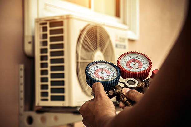 Professional Heat Pump Repair technician working in Oliver Springs, TN